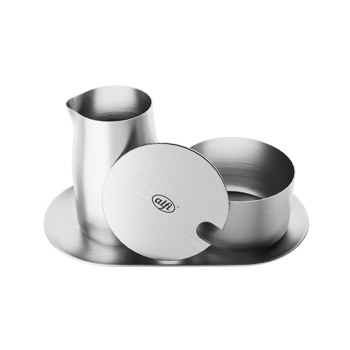 Das Bild zeigt ein elegantes Set aus silbernem Edelstahl, bestehend aus einer kleinen Kanne und einem Behälter mit Deckel, die auf einem ovalen Tablett arrangiert sind. Die Oberfläche der Gegenstände ist glatt mit einem feinen Schliff.
