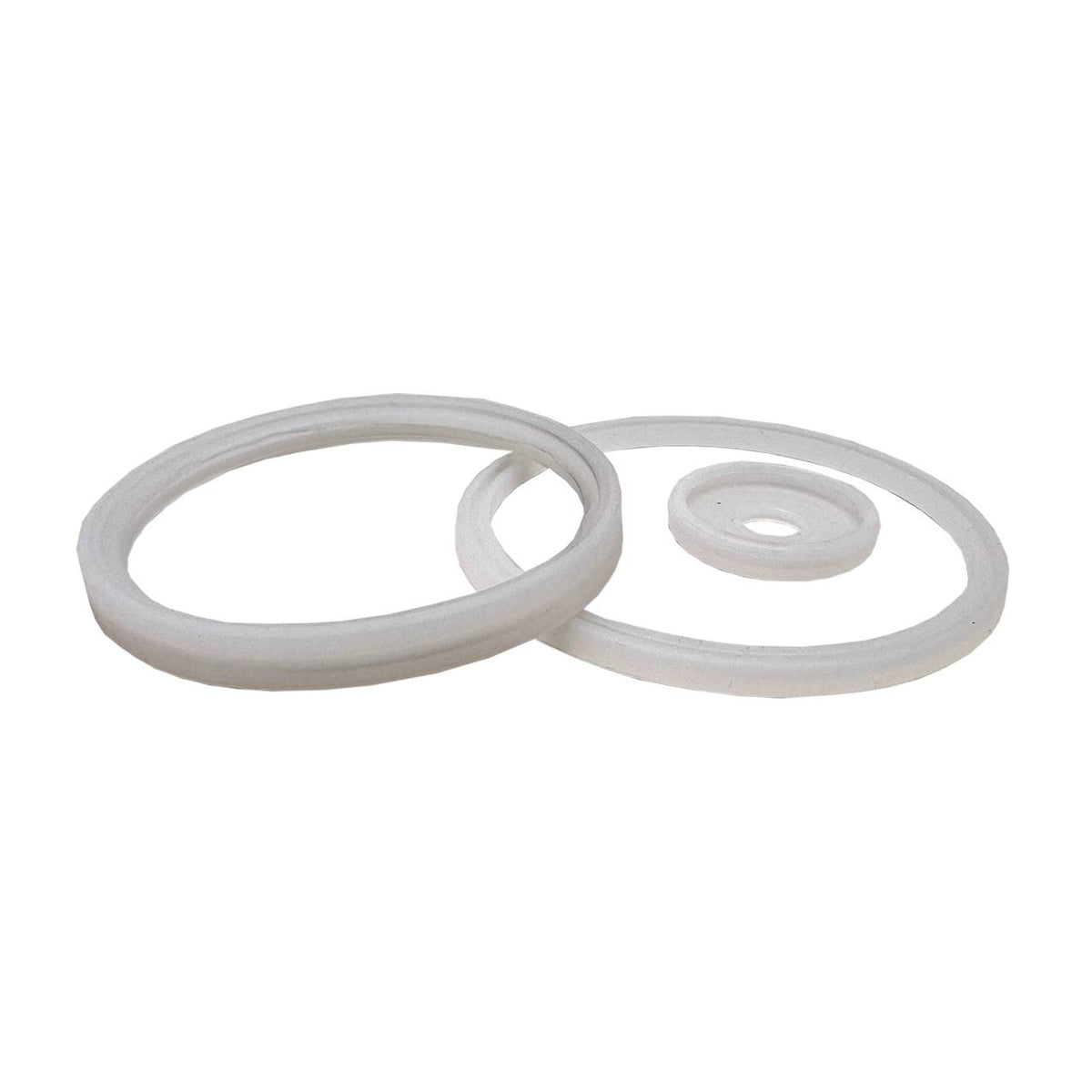 Das Bild zeigt drei weiße, runde Dichtungsringe in verschiedenen Größen, die übereinander liegen. Diese Ringe sind flach und haben unterschiedliche Durchmesser. Sie bestehen vermutlich aus einem weichen Material wie Gummi oder Silikon.